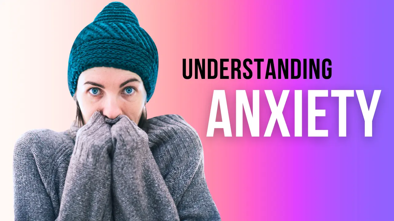 understanding anxiety - woman dressed snuggly holding her hands over her mouth